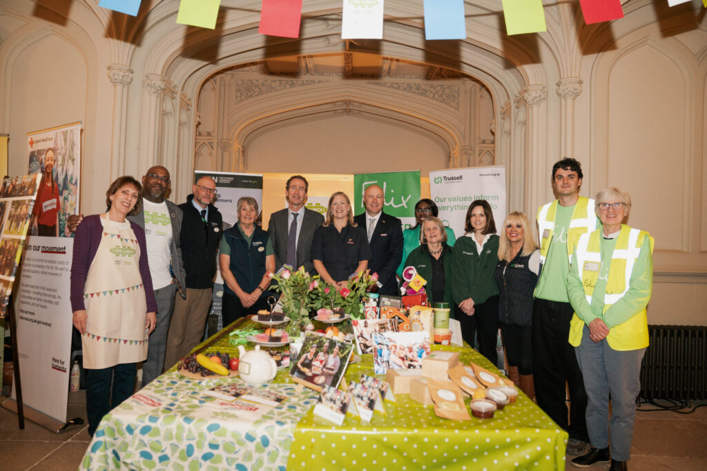 Volunteers gather around a large table at Windsor Castle